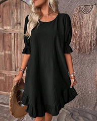 Mia jurk met rucherand en smock