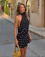 Serena halterneck minijurk met polkadots en open rug