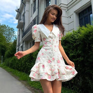 Andromeda bloemen mini-jurk met pofmouwen